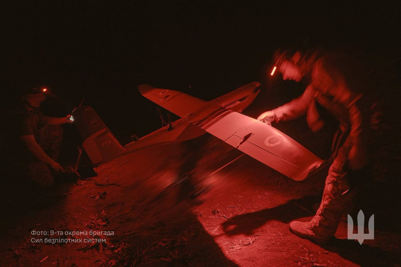 File photo: Ukrainian soldiers prepare an attack drone for launch