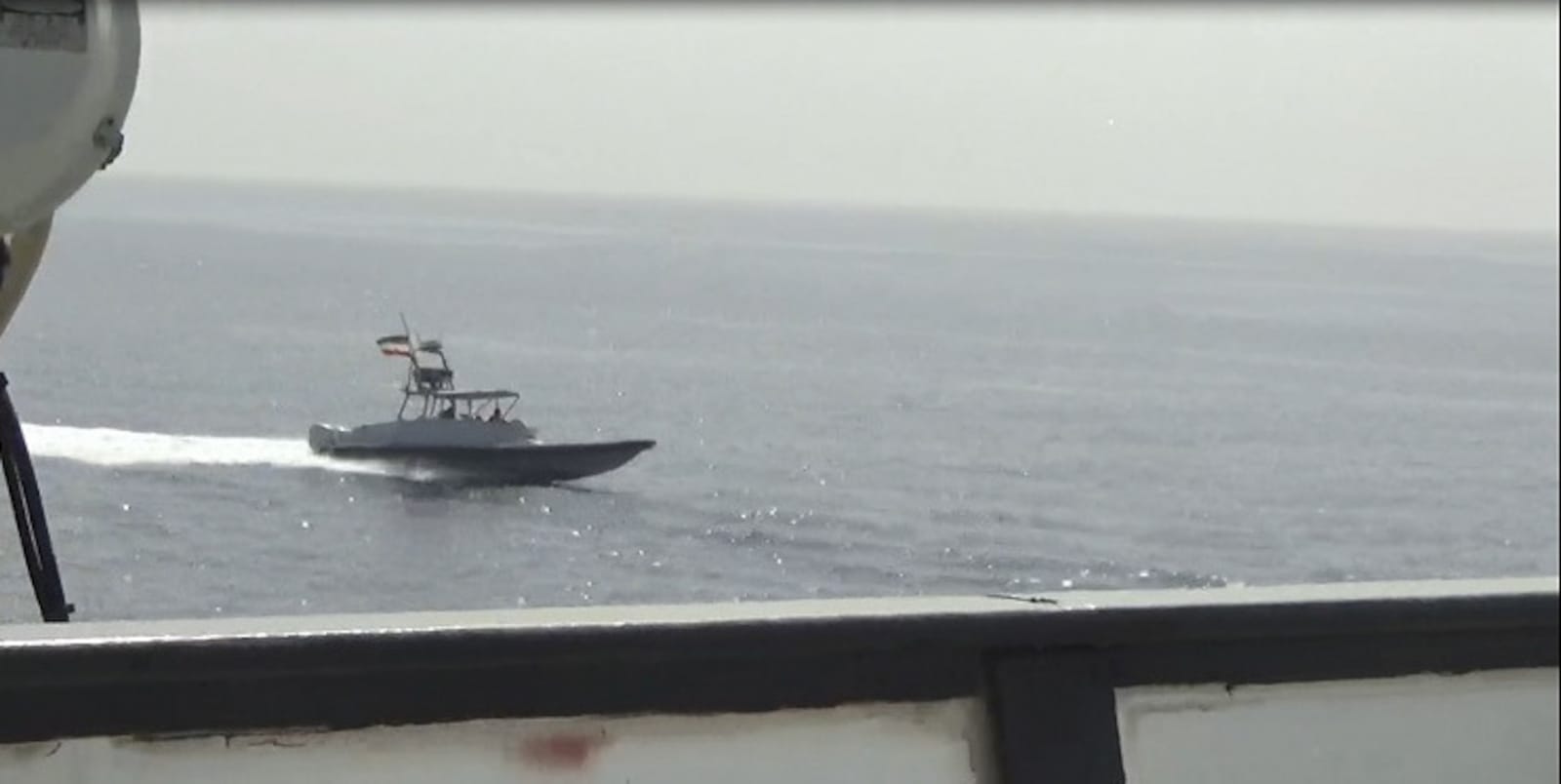File photo: Revolutionary Guard navy speedboat approaching US Navy vessels