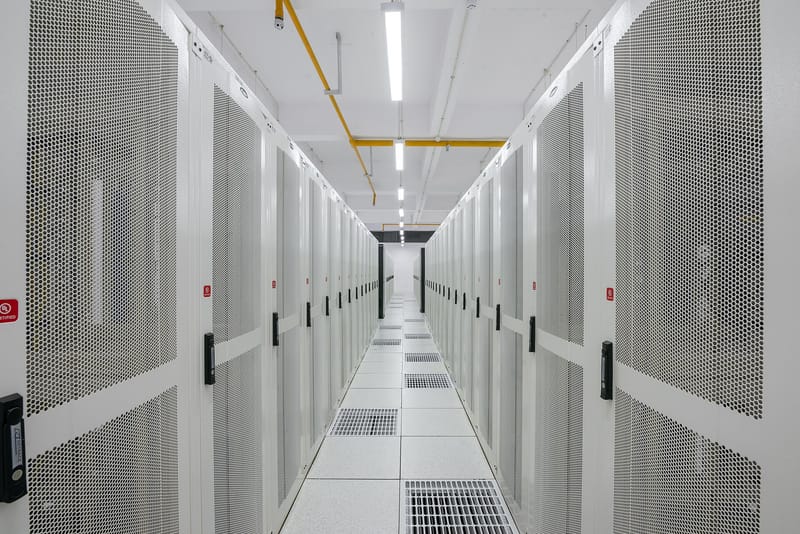 AI investment exceeds earlier technology booms, Reuters analysis says; economists question returns
